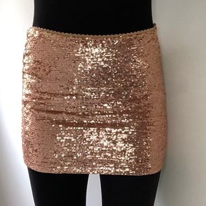 Sequined pink mini skirt